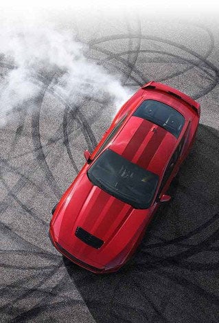 Overhead view of a 2024 Ford Mustang® model with tire tracks on pavement | Bell-McCall Company in Hamilton MT
