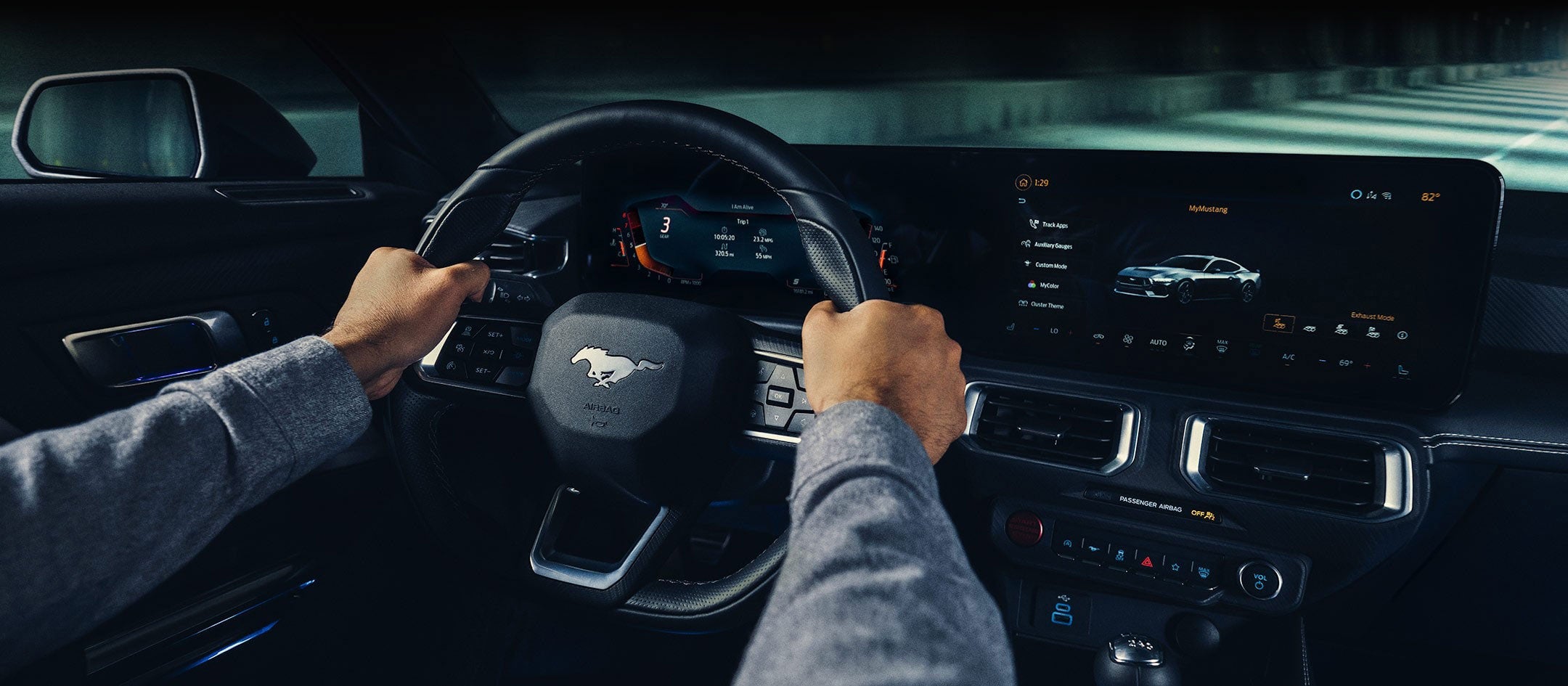 A 2024 Ford Mustang® model interior with a person driving | Bell-McCall Company in Hamilton MT